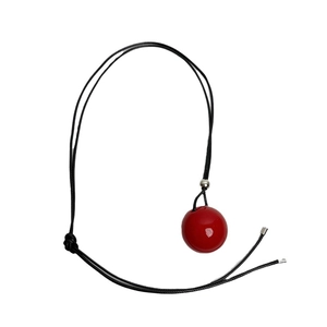 Minimalist long necklace with glossy red sphere pendant and black cord with silver beads
