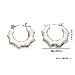 Detail view of silver bamboo-style stud earrings with size 2.2cm and weight 7.8g
