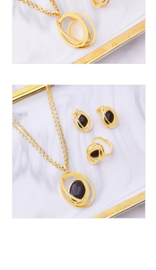 Flat lay of gold layered turquoise hollow globe jewelry sets on white marble tray