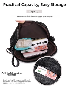 Détail du sac bandoulière noir gaufré montrant l'espace intérieur et la poche antivol