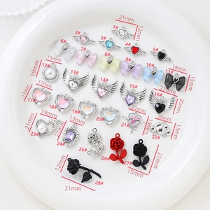 Detailed collection of assorted alloy bow and heart pendants with size labels in mm