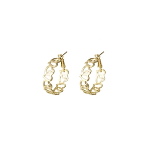Exaggerated gold hollow heart-shaped C-shaped hoop earrings with a modern geometric design