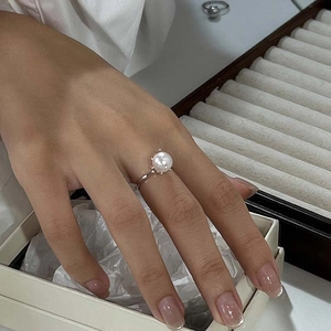 Elegant S925 sterling silver adjustable ring featuring a large white pearl in a 6-prong setting