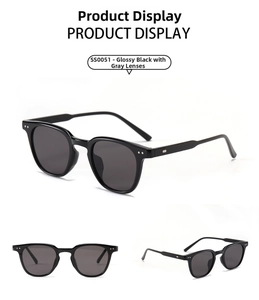 Detail view of SS0051 round small frame sunglasses with silver rivets and grey lenses