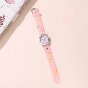 Kids watch with pink flamingo silicone strap and star patterns on a pink background