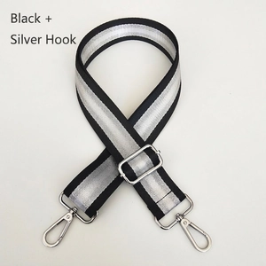 Detail of 3.8cm nylon bag strap with silver stripe patterns and swivel metal hooks