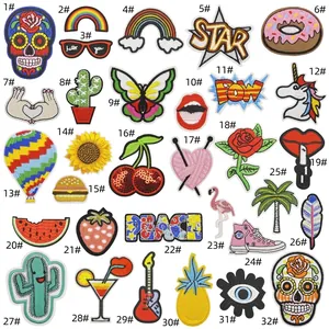 Detailed collection of 32 colorful embroidered iron-on patches with various heart and cute icons