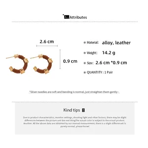 Tableau détaillé des tailles pour boucles d'oreilles en cuir marron et alliage