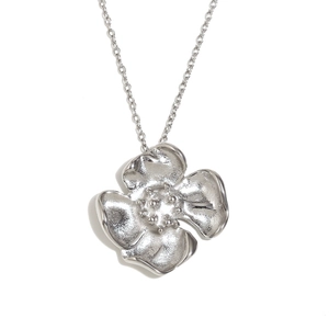 Silver stainless steel necklace with realistic four-leaf clover pendant on white background