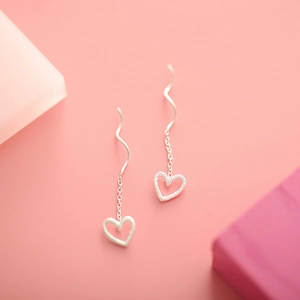 Elegant silver heart tassel earrings with wavy chain design for women's daily wear