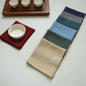 Detailed macro view of waffle weave texture and color variety of linen cotton napkins