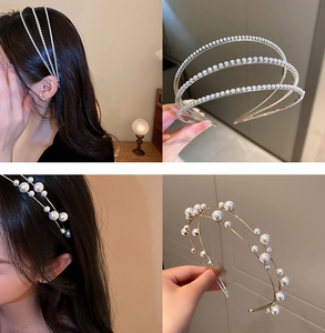 Detail of French vintage pearl headband with delicate crystals and thin golden metal frame