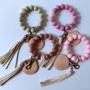 Food-grade silicone bead wristlet keychain with wood charm and faux suede tassel