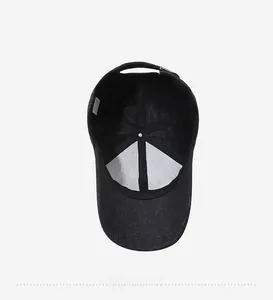 Detail view of 100% cotton baseball cap interior showing seams and metal buckle
