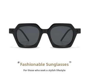 Detail view of bold hexagonal black frame sunglasses with deep grey lenses and geometric lines