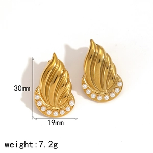 Golden flame-shaped textured leaf earrings with white pearls and 18k gold plating