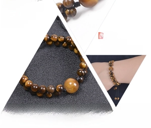 Detail of 6mm natural tiger eye stone double-layer braided bracelet with adjustable cord.