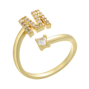 Detailed shot of golden adjustable ring with micro-pave letter M and round zirconia stone