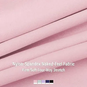 Two-piece yoga set in pink nylon spandex fabric featuring four-way stretch and soft texture