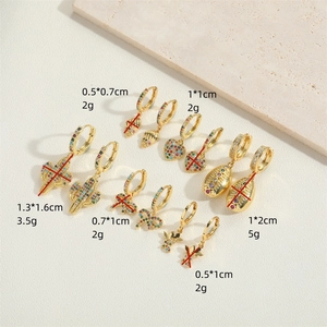 French vintage gold earrings set with bow, cactus, and zircon pendants for women