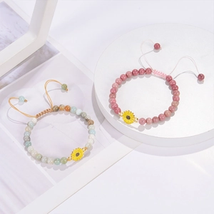 Red wood grain stone bracelet with sunflower charm and adjustable pink braided rope cord