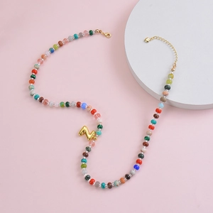 Bohemian colorful beaded necklace with a golden bubble letter Z pendant for women