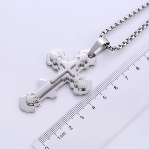 Detailed view of silver triple layer cross pendant with ruler showing 6cm length size