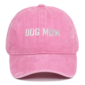 Pink washed cotton baseball cap featuring white DOG MOM embroidery on the front
