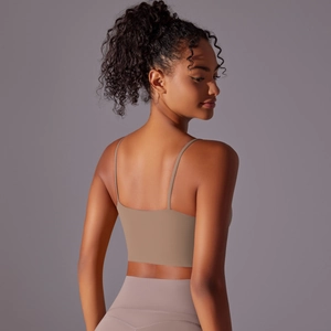 Close-up of seamless yoga tank top back featuring thin straps and elastic fabric texture