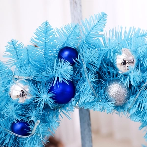 Blue Christmas wreath with PVC pine needles, silver ornaments and warm LED lights