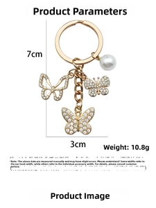 Detailed size chart for butterfly keychain with rhinestones and pearl pendant details