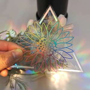 Rainbow prism sunflower suncatcher detail with holographic effect on static window film