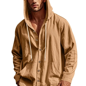 Close-up of ocher linen hooded shirt featuring natural texture and white drawstrings