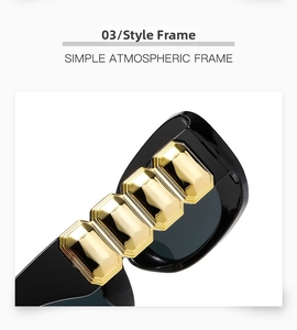 Detail of black frame with gold geometric metal accents and simple atmospheric design