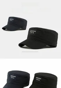 Detailed close-up of flat top military cap with embroidered patch and twill cotton fabric