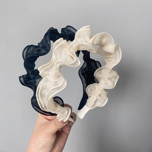 Elegant wide headband with pleated chiffon ruffled design in black and white colors