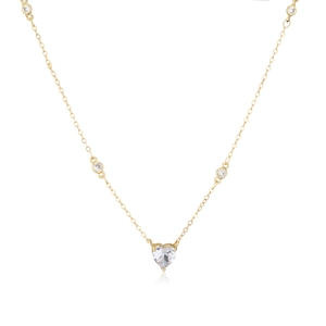 Macro shot of gold heart necklace featuring pavé-set clear zircons and round accent stones