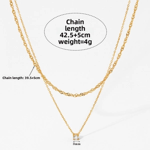 Detail of 18K gold-plated double-layer necklace with 3mm cubic zirconia pendant