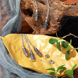Silver patterned urn necklaces with colorful gemstones and memorial funnel kit