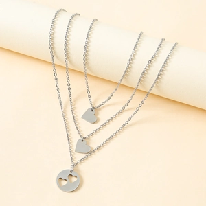 Three-layer stainless steel heart pendant necklace set with minimalist cut-out design