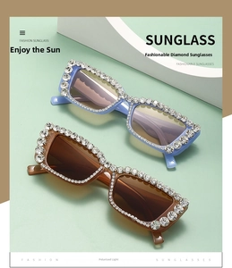 Detail of square polarized sunglasses with hand-set rhinestones and wide frames