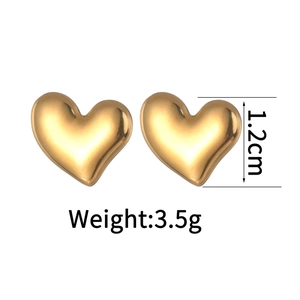 Minimalist gold heart stud earrings with a polished finish and elegant metallic glow