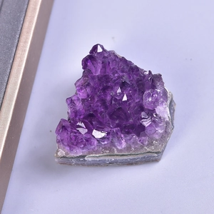 Natural Uruguay amethyst crystal cluster specimen with deep purple druzy on rock base