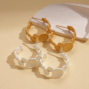 Irregular hammered geometric C-shape hoop earrings in gold and silver finish