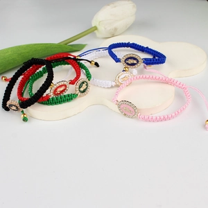 Handmade woven Virgin Mary bracelets with crystal charms in multiple colors