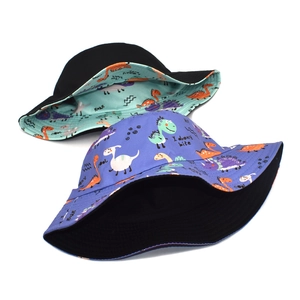 Double-sided reversible cotton bucket hat with colorful cartoon dinosaur print for kids