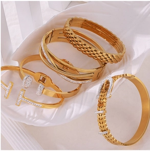 Close-up of gold-plated titanium steel bracelet set with geometric diamond patterns