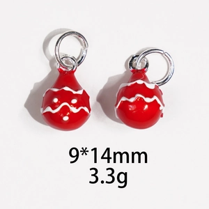 Detailed view of red bell pendant with wave pattern showing 9x14mm size and 3.3g weight