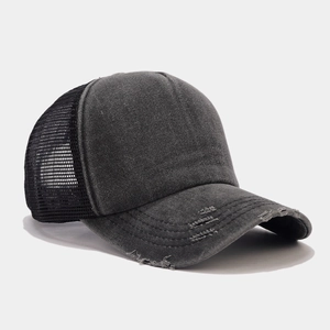 Close-up of distressed baseball cap with breathable mesh and vintage washed finish