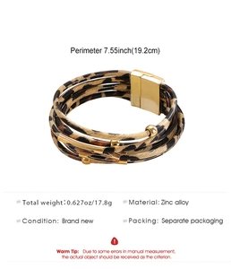 Detail showing the magnetic clasp and leopard print texture on a bohemian wrap bracelet